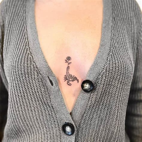 between boobs tattoo|The Ultimate Guide to Sternum Tattoos: Meaningful Art and Care .